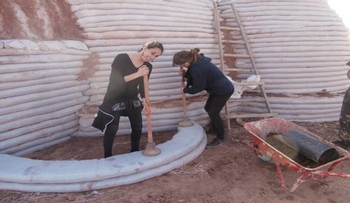 European volunteers building a space which will be used for medicinal plants.